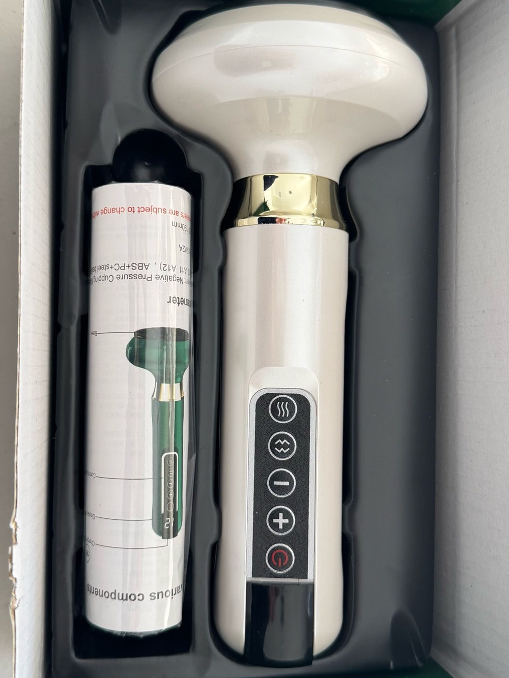 White and Gold Handheld Massager with Adjustable Settings